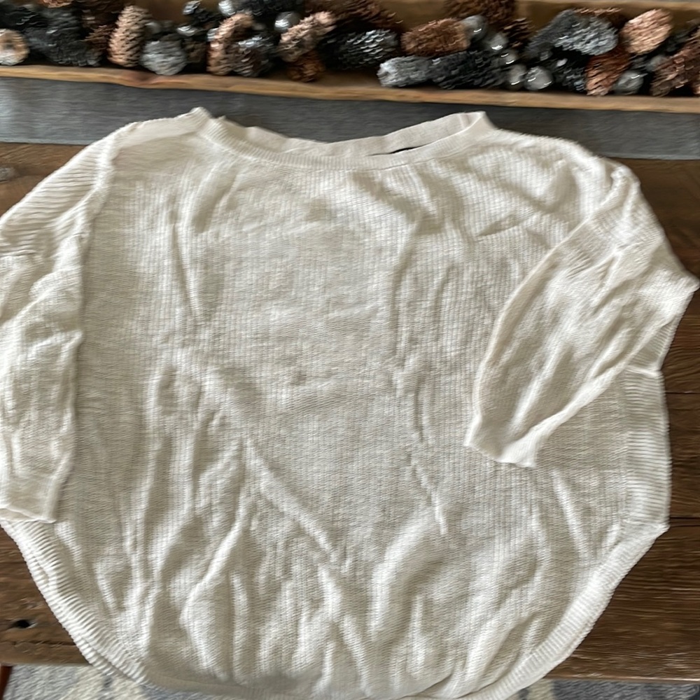 Detailed back scoop bottom sweater